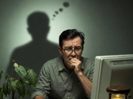 Financial Planning for Retirement: 10 Mistakes to Avoid Anxious man staring at red retirement losses with grim reaper shadow